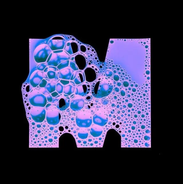Neon Purple-Blue Soap Bubble Cluster in Rectangular Cutout (Macro)