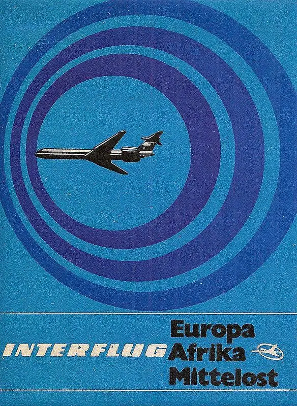 Interflug vintage travel poster — stylized jet over concentric blue rings