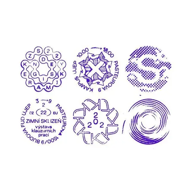 Set of six purple ink stamp impressions on white paper