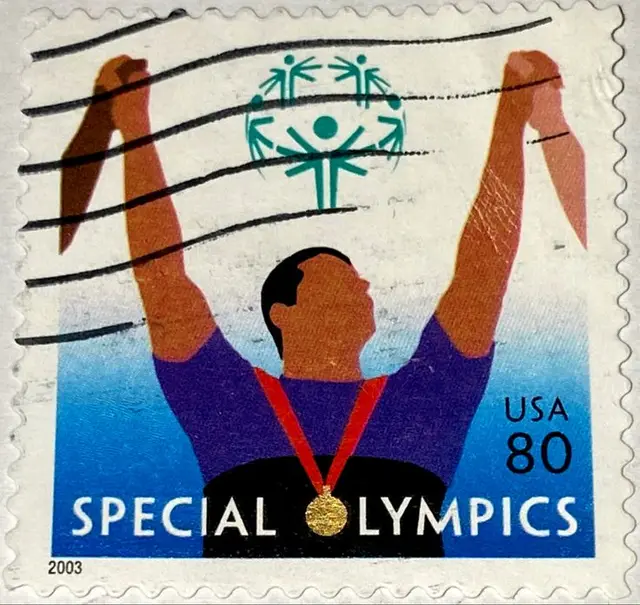 Special Olympics US postage stamp — athlete with gold medal (USA 80)