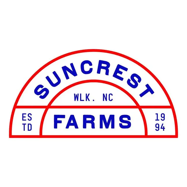 Suncrest Farms semicircular badge logo — red outline with blue type