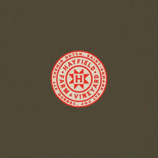Hayfield Farm & Vineyard red seal on olive background