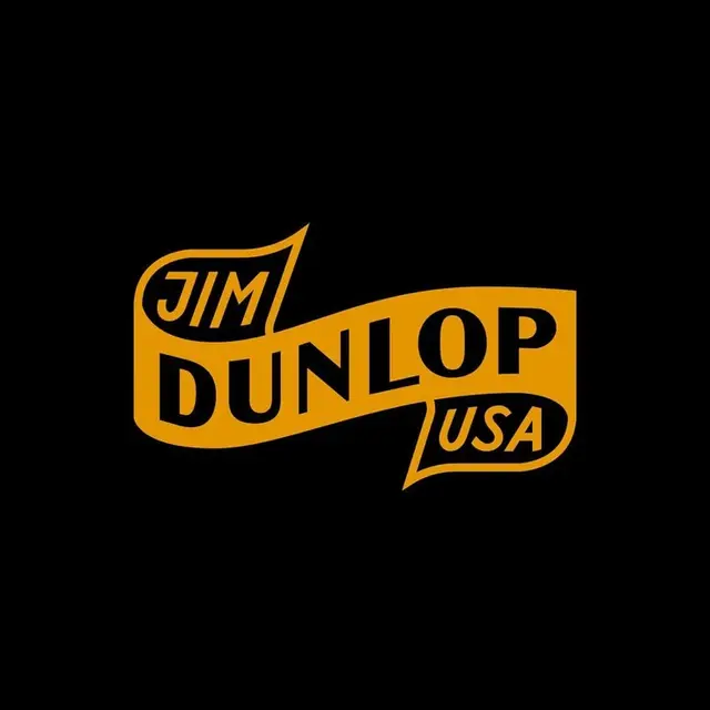 Jim Dunlop USA ribbon wordmark — mustard yellow on black