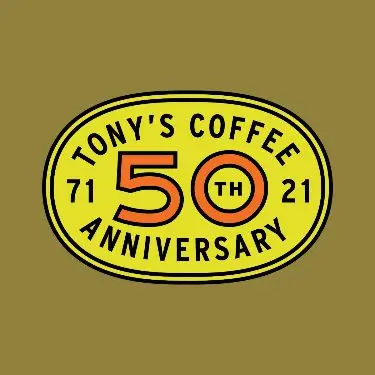 Tony's Coffee 50th Anniversary oval badge — yellow retro logo