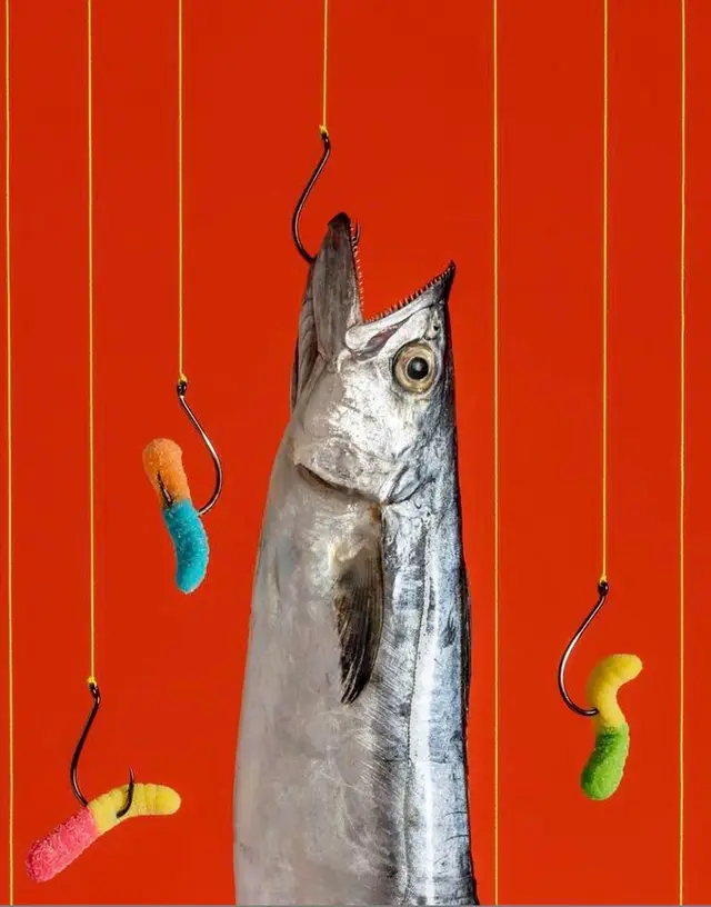 Silver Fish with Gummy-Worm Bait on Red Background