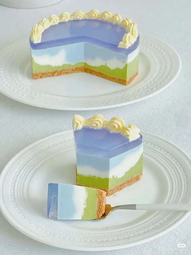 Pastel layered mirror-glaze 'sky' cake with crumb crust