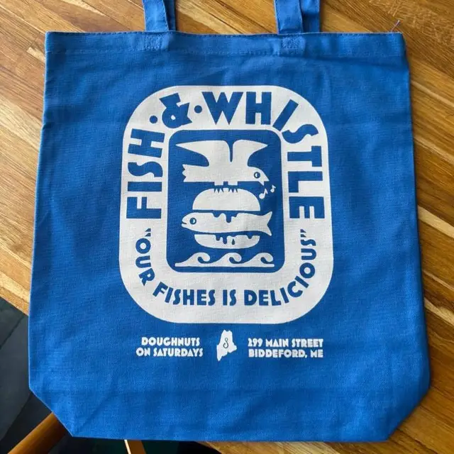 Blue canvas tote with 'Fish & Whistle' screenprint — Biddeford, ME