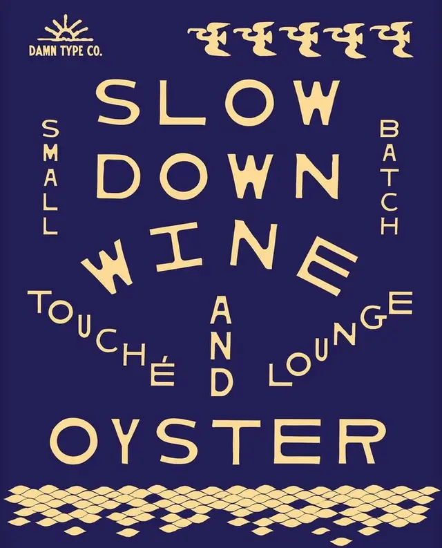 Slow Down — navy typographic poster (DAMN TYPE CO.)