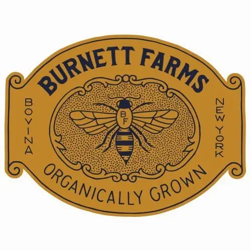 Burnett Farms bee badge — mustard 'Organically Grown' farm label