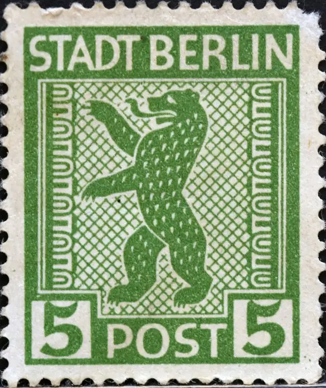 Green 'Stadt Berlin' postage stamp with standing bear and denomination 5