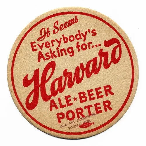 Vintage round beer coaster reading 'Harvard Ale Beer Porter' in red on tan