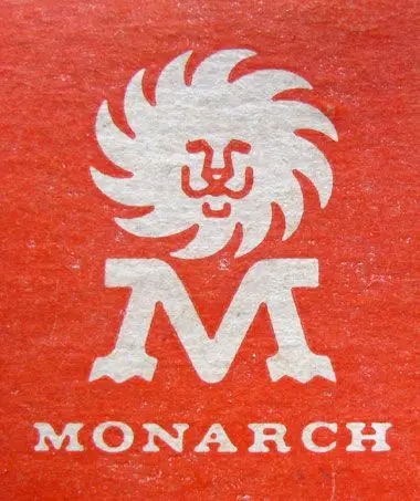 Monarch wordmark and lion emblem printed on red textured paper