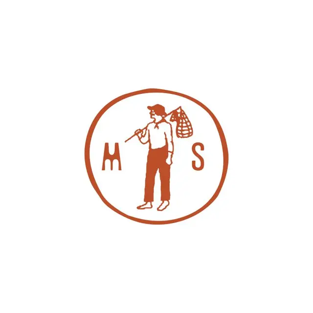 Vintage circular rust-orange logo — person with bindle between letters M and S