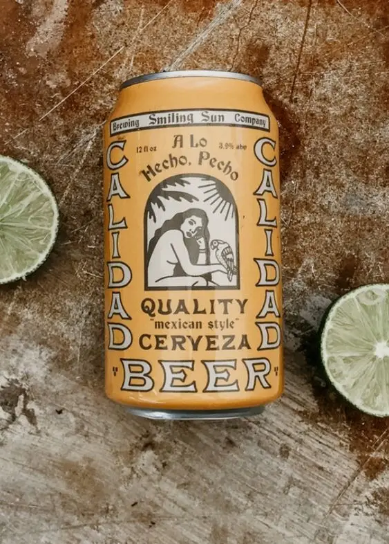 Calidad Mexican‑style Beer can with vintage label and lime halves