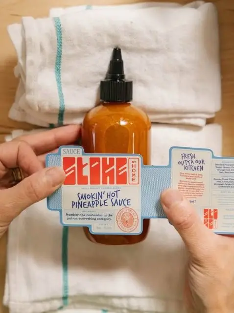 Smokin' Hot Pineapple Sauce — amber squeeze bottle with sleeve label