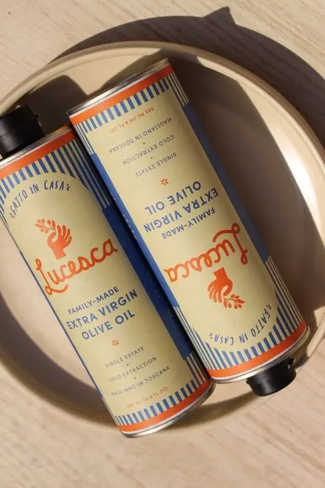 Lucesca extra virgin olive oil tins on ceramic plate