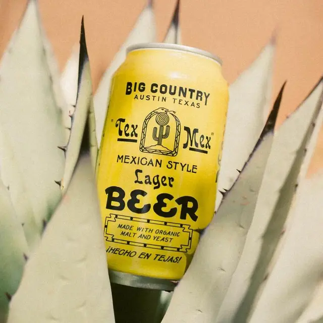 Big Country "Tex Mex" Mexican‑Style Lager can nestled in agave leaves
