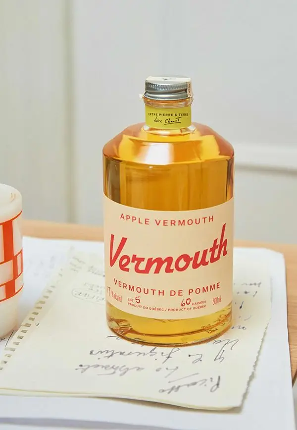 Apple Vermouth bottle — cream label with red script