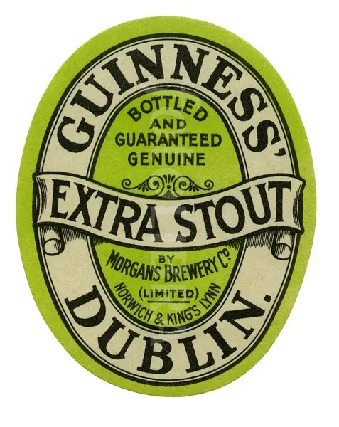 Vintage Guinness Extra Stout oval beer label (lime green)