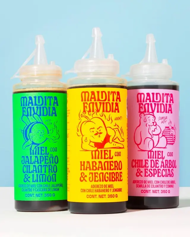 Maldita Envidia honey hot sauces — three colorful squeeze bottles (jalapeño, habanero, aŕ