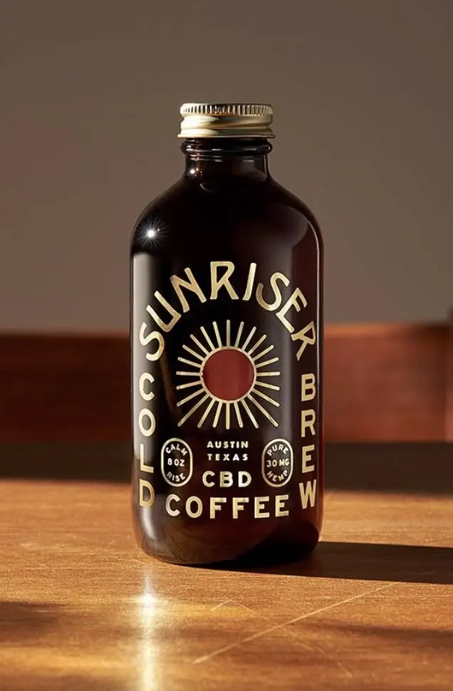 Sunriser Cold Brew CBD Coffee — amber glass bottle with gold label