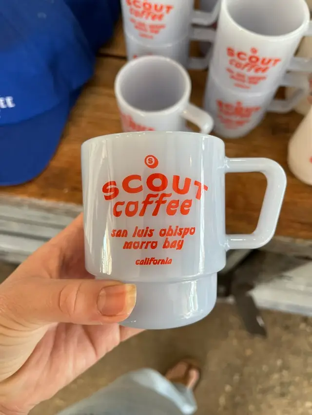 Scout Coffee white ceramic stackable mug with orange logo — San Luis Obispo / Morro Bay,CA
