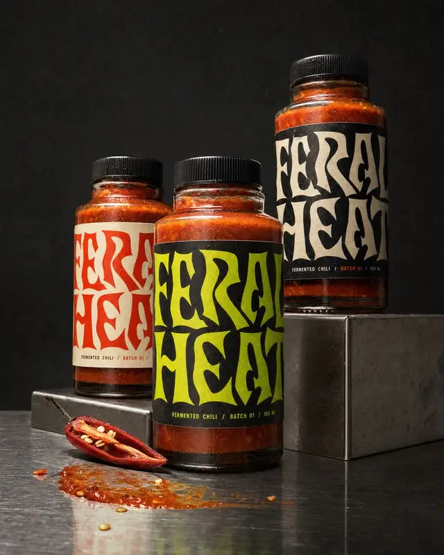 Feral Heat fermented chili sauce — three jars with bold typographic labels