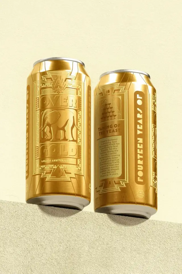 Limited-edition metallic gold beer cans with embossed elephant motif