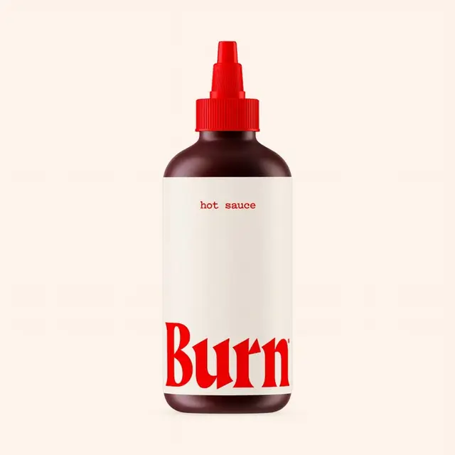 Minimalist hot sauce bottle with bold red "Burn" wordmark