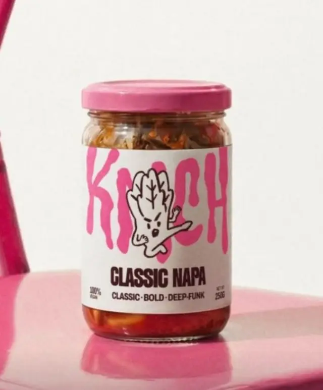 Glass jar labeled "CLASSIC NAPA" with pink lid — studio product shot