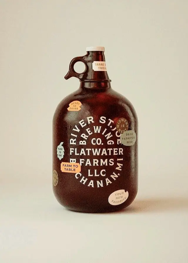 River St. Brewing Co. / Flatwater Farms brown growler — studio product photo