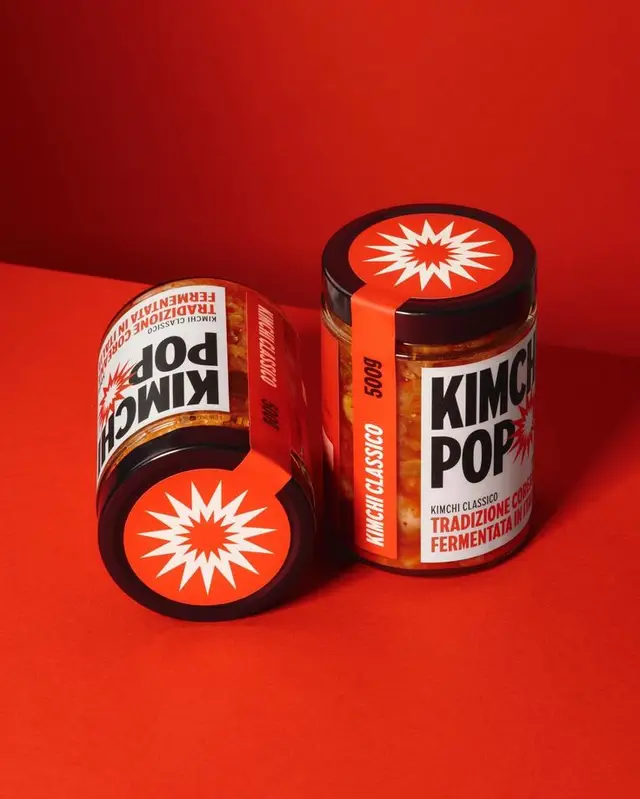 Kimchi Pop — bold red jar packaging with starburst logo