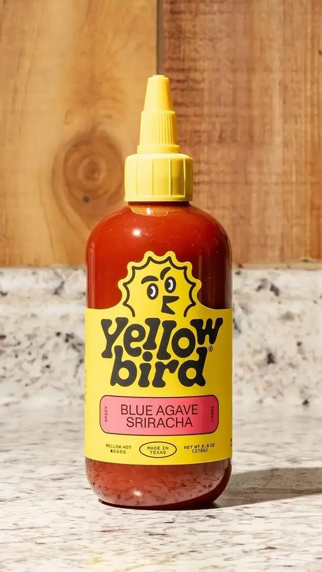 Yellowbird Blue Agave Sriracha squeeze bottle with yellow label