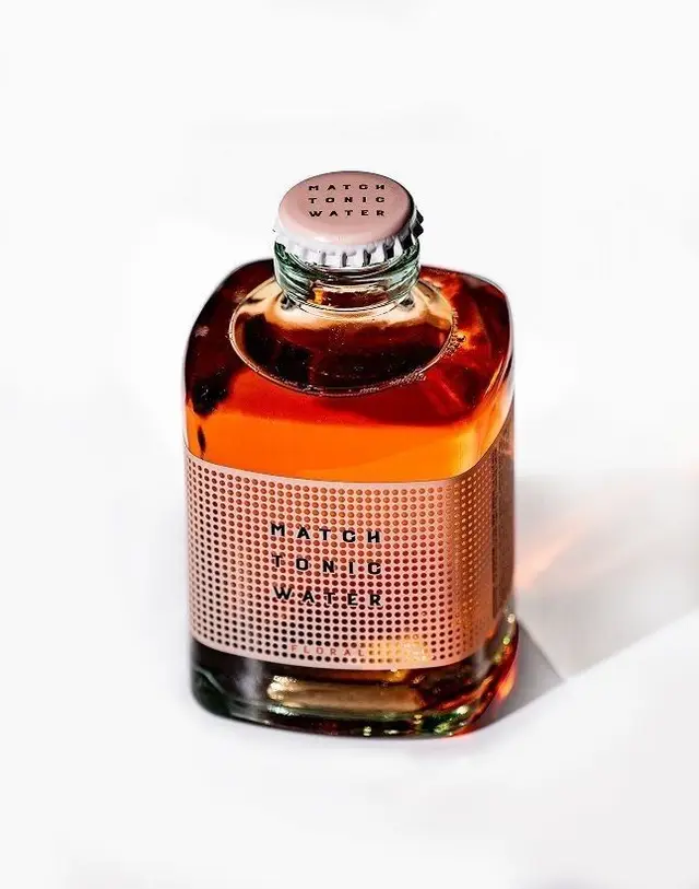 MATCH Tonic Water — square glass bottle with rose-gold halftone label