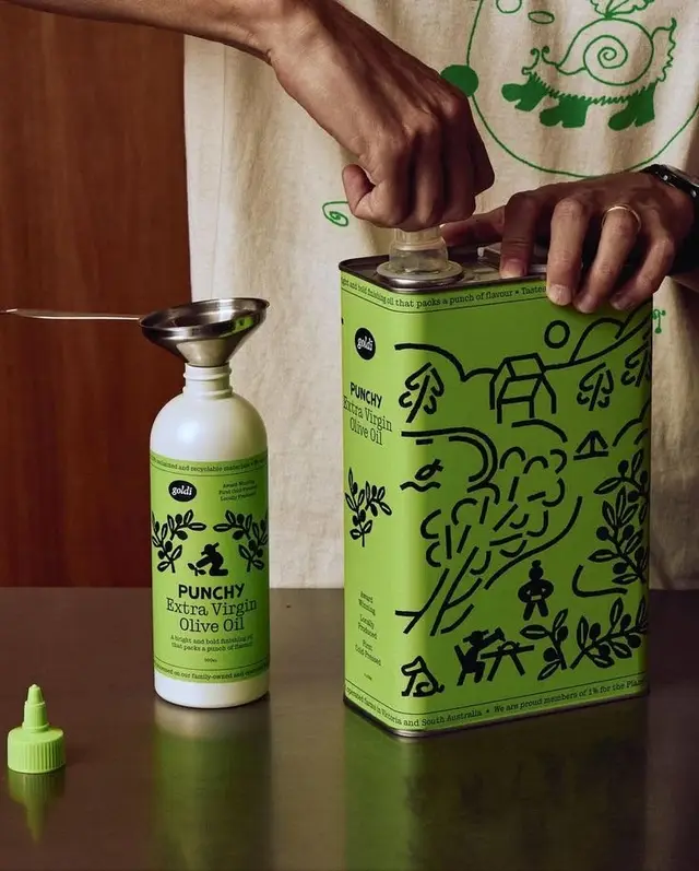 Punchy Extra Virgin Olive Oil — lime-green refill tin being poured into refill bottle