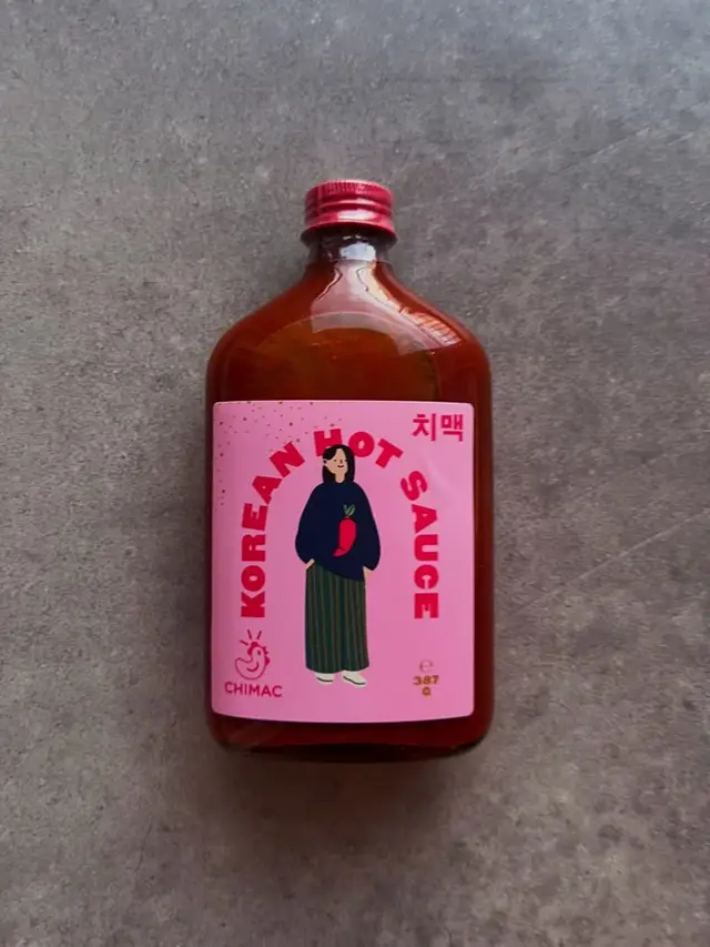 Glass bottle of KOREAN HOT SAUCE with pink CHIMAC label