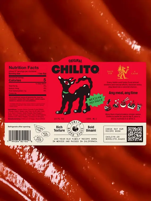 CHILITO Mexican Hot Sauce label on glossy tomato sauce background
