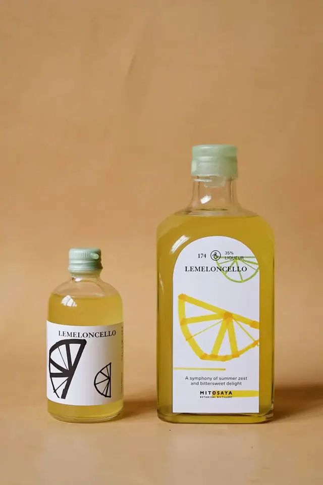 Lemeloncello lemon liqueur bottles with citrus-wedge labels