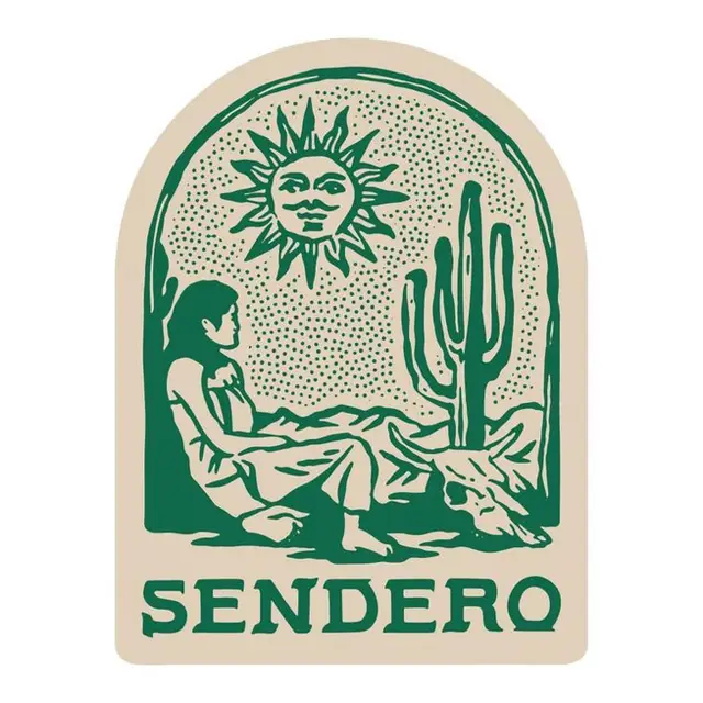 SENDERO — linocut-style arched desert label with seated figure and saguaro