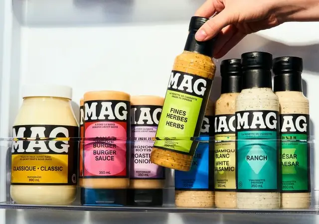 MAG brand salad dressings and sauces lined on refrigerator shelf