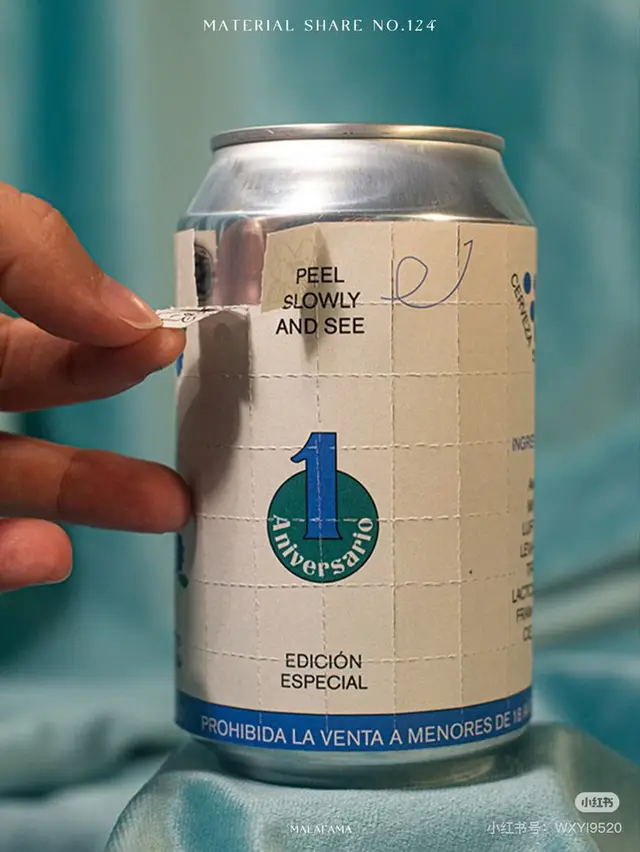 Interactive perforated sticker on aluminum can — 1 Aniversario edición especial