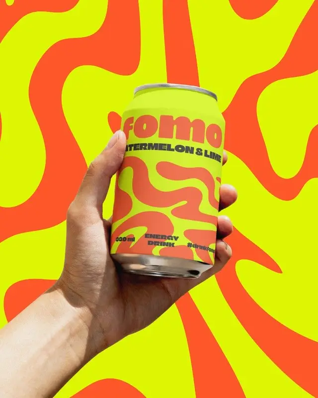 Fomo Watermelon & Lime energy drink can — neon swirl packaging