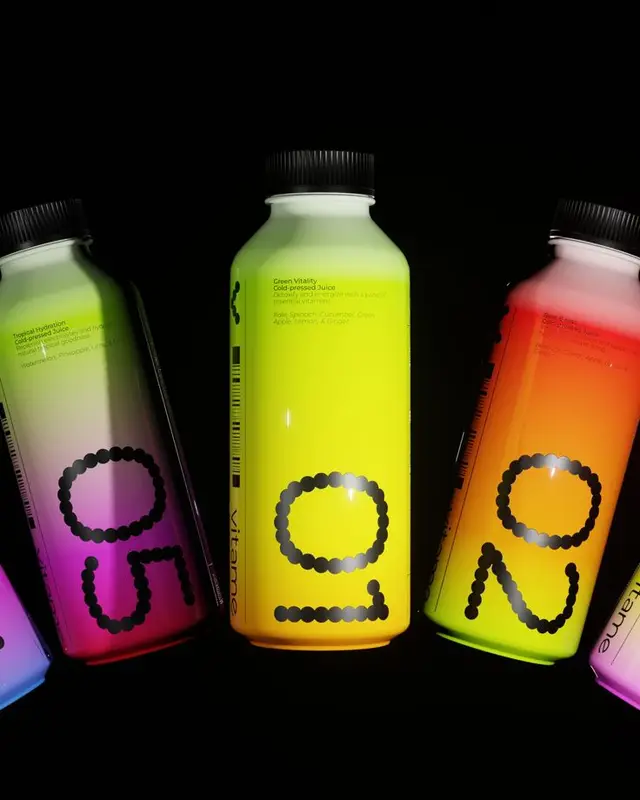 Neon-gradient cold-pressed juice bottles with dot-matrix logo