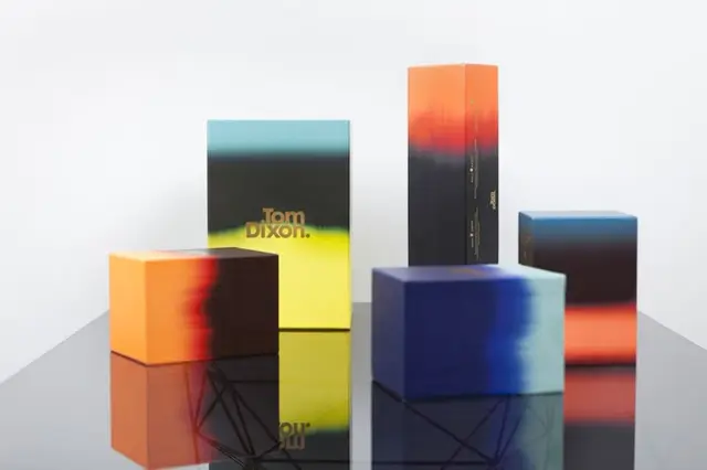 Tom Dixon gradient packaging set on glossy black display