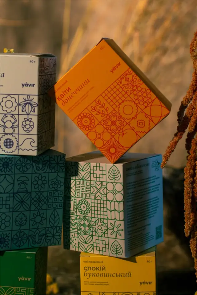 Yavir herbal tea packaging — stacked boxes with geometric folk patterns