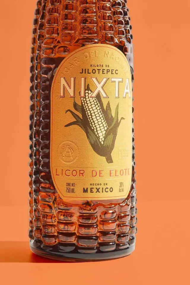 Nixta Licor de Elote — amber corn liqueur bottle with embossed glass