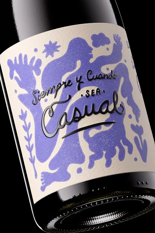 Wine label with lavender abstract figures and embossed hand-lettering