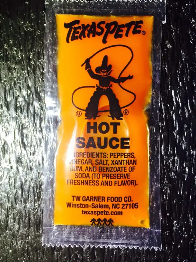 Texas Pete hot sauce single‑serve packet with cowboy logo