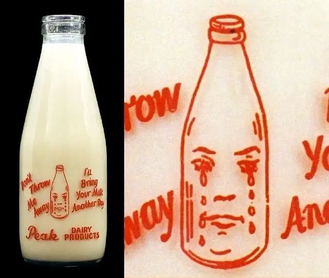 Vintage Peak Dairy Products glass milk bottle with red crying-bottle illustration