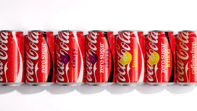 Coca-Cola flavor can lineup — Zero Sugar, Cherry, Lemon, Caffeine-Free
